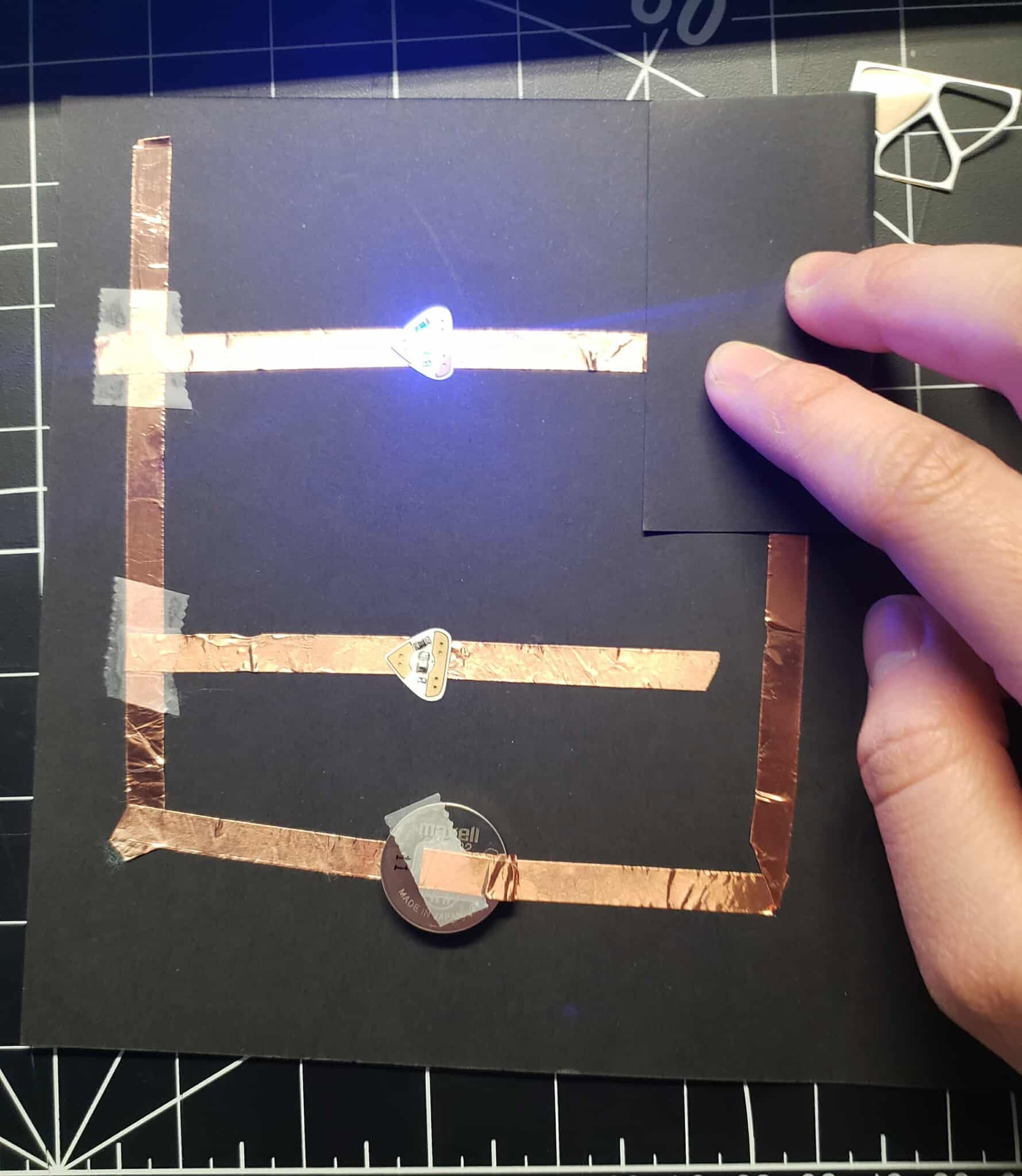 The top light is turned on by closing the top flap