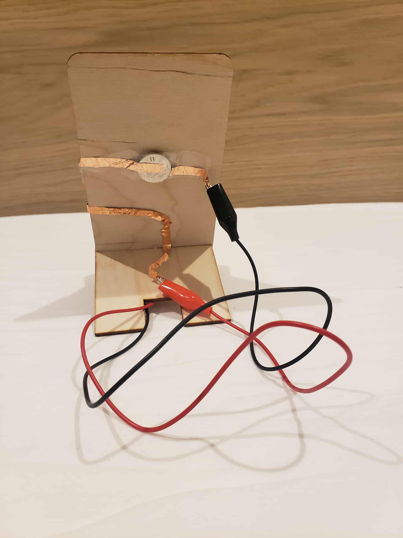 The back of the phone holder's circuit