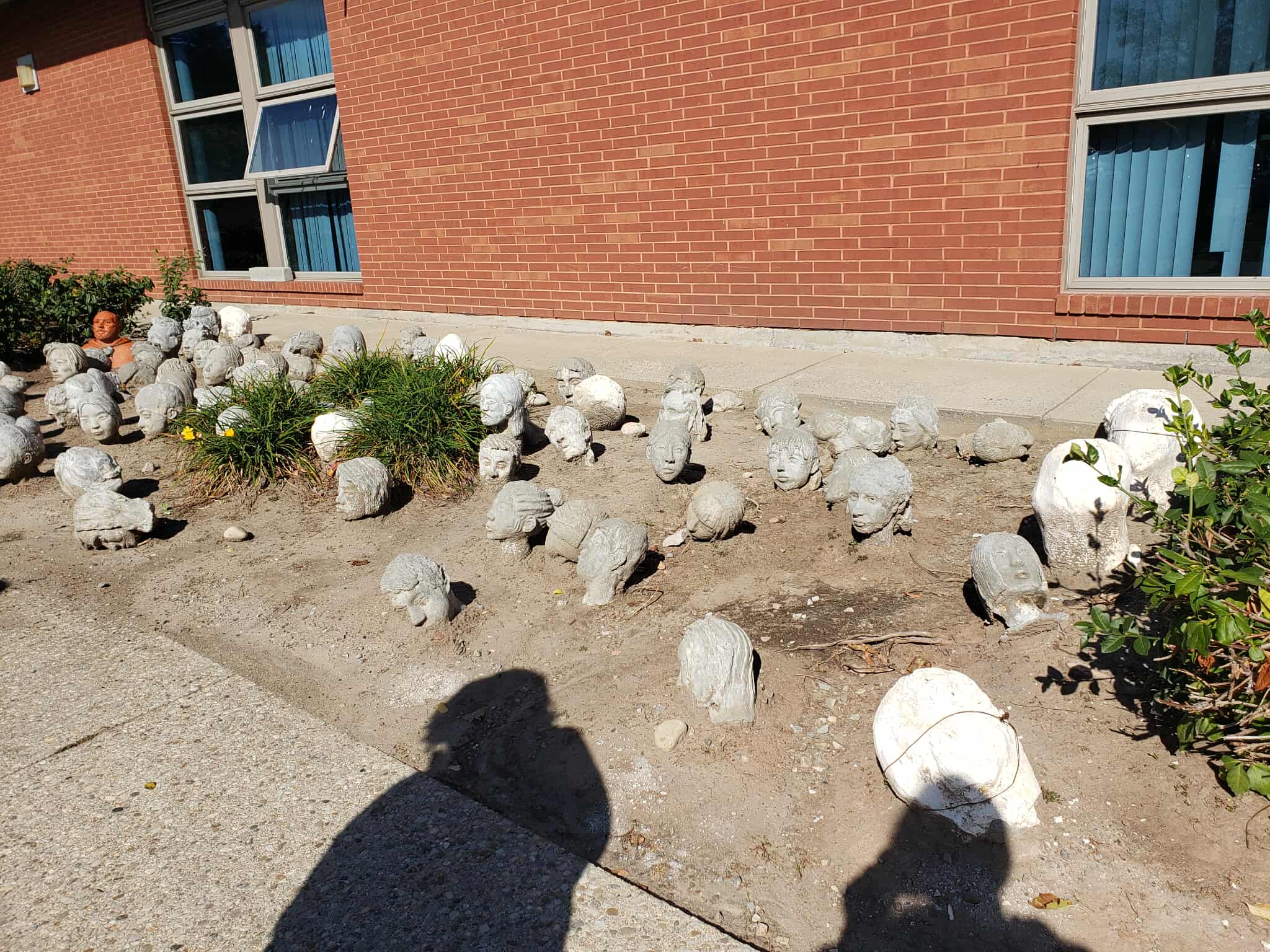 These head statues are outside the AA building, quite near the mosiac mural. I never look at this part of the school before, so I was suprised to see them and found them to be very funny.