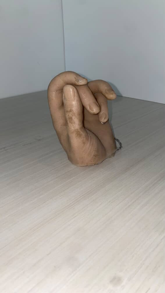 This is a Rubber hand. It is a refined and maleable material